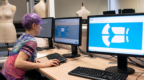 A woman working at a computer