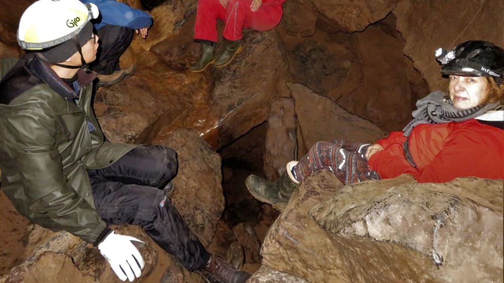 A group of students in a cave