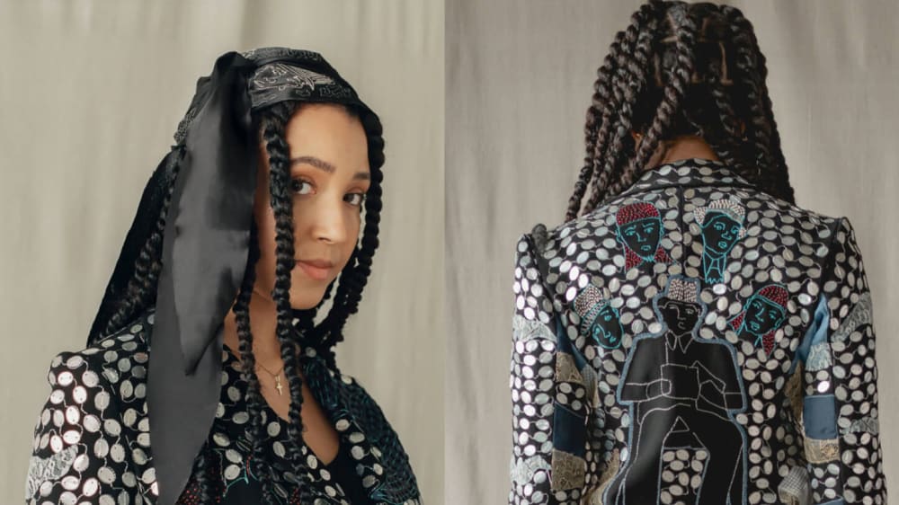 A model wearing an embroidered suit