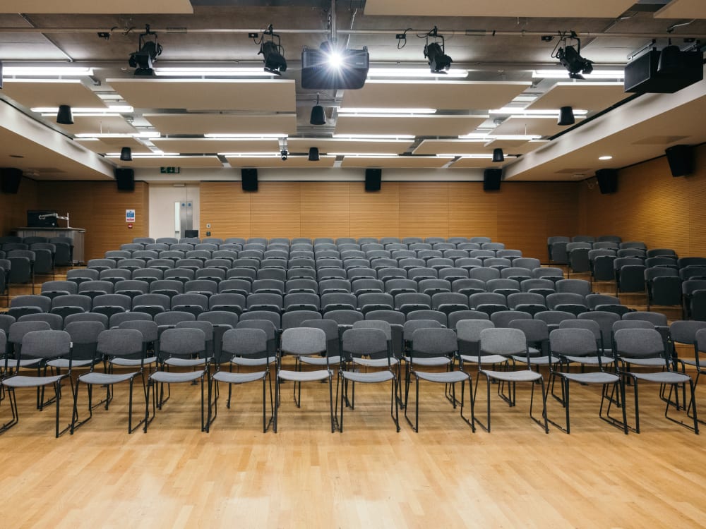 View from the front: seating and lighting set up in the LVMH lecture theatre.