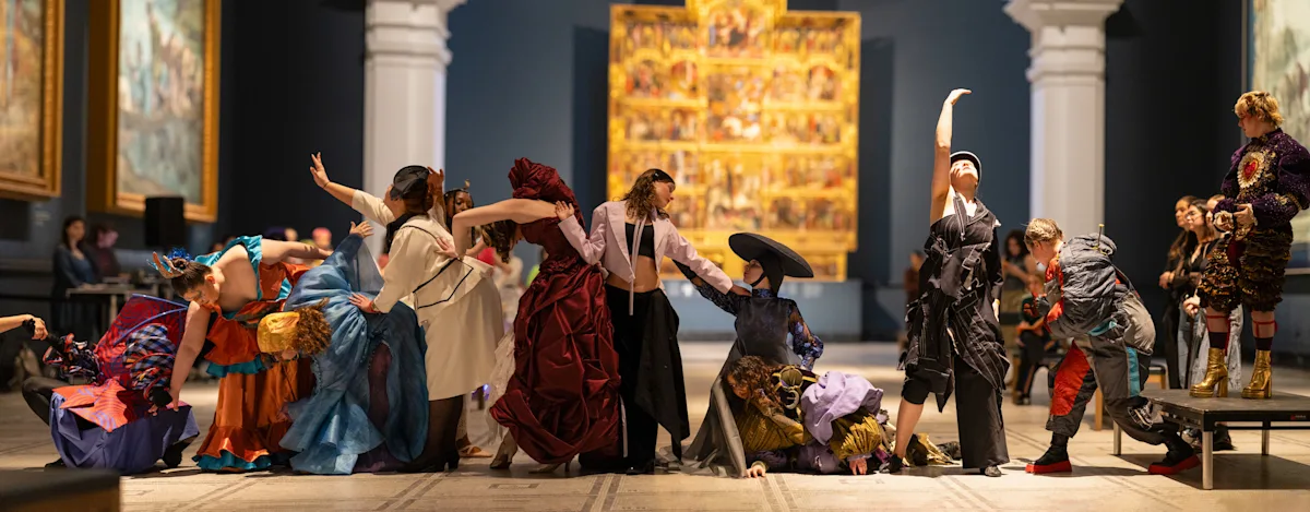 Performers in an art gallery