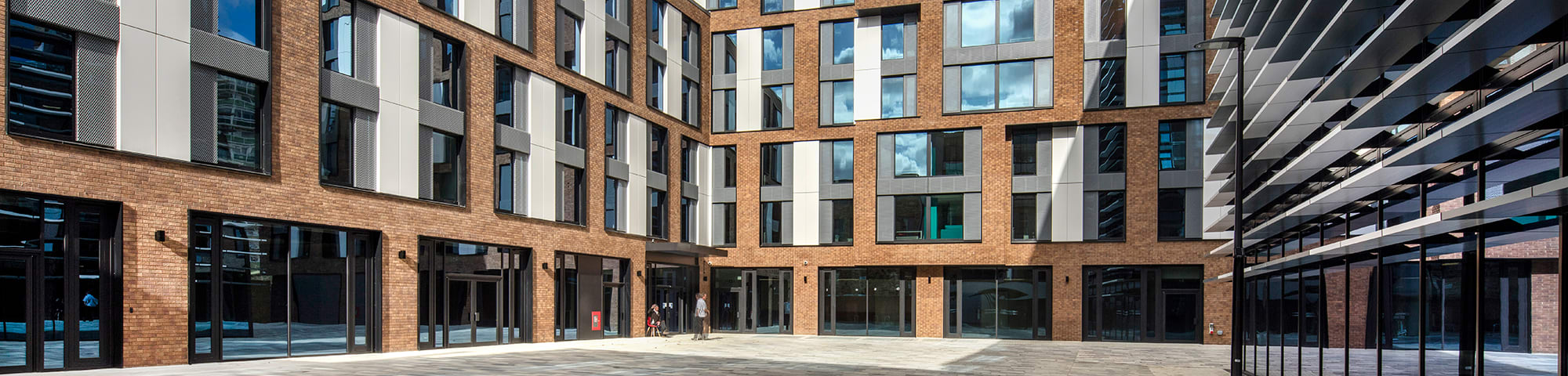 Exterior shot of hall and courtyard between Gardens House and Camberwell College of Arts