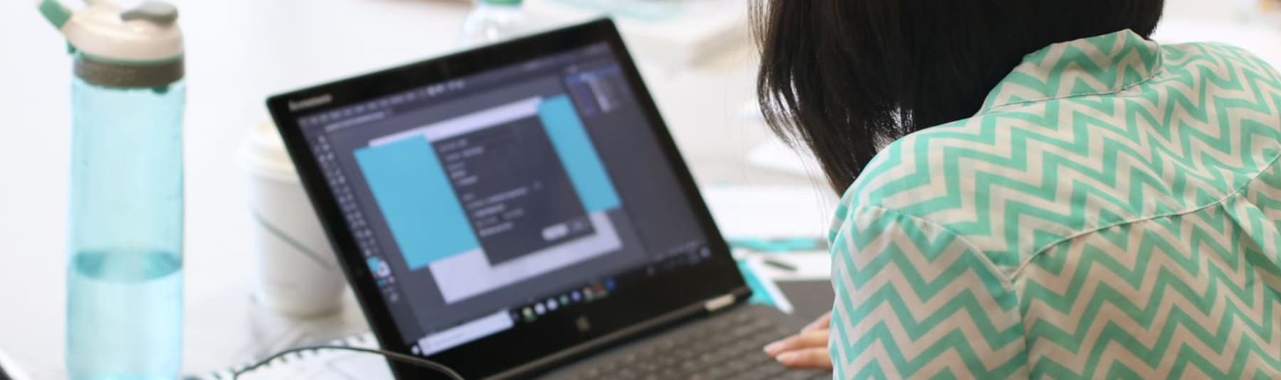 A person working at a laptop