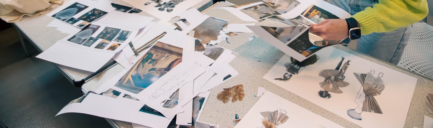 Students cutting illustrations