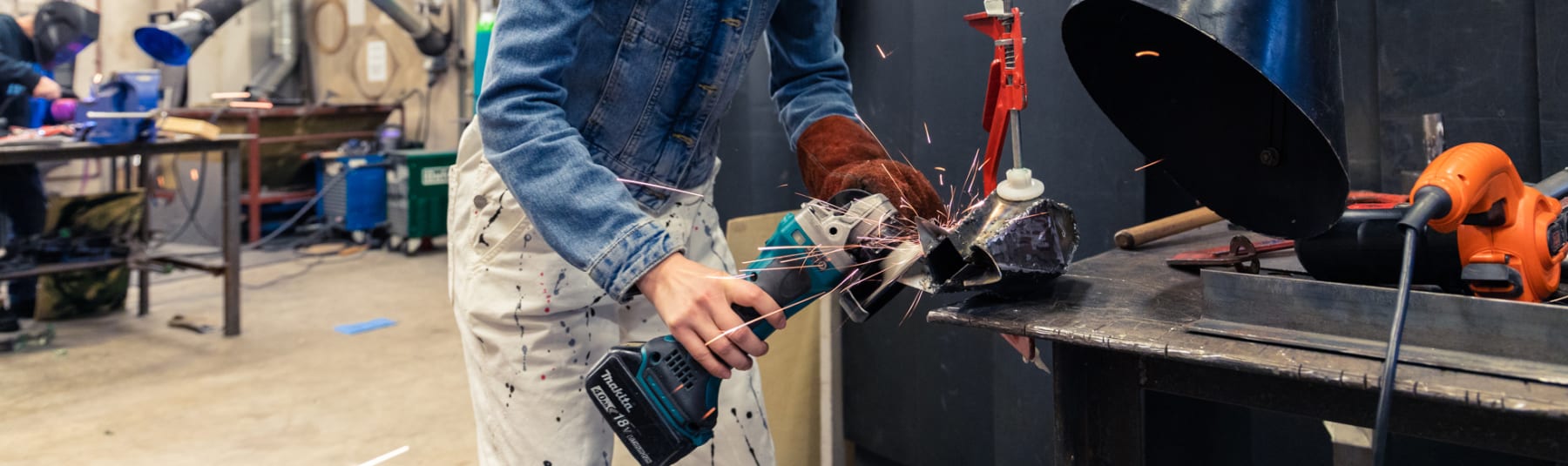 Student working in metalwork studio