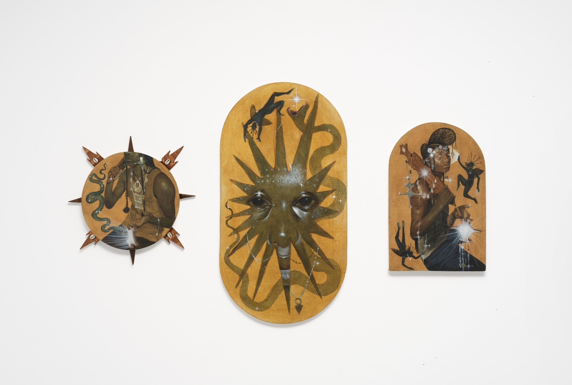 3 paintings with two figures on either side