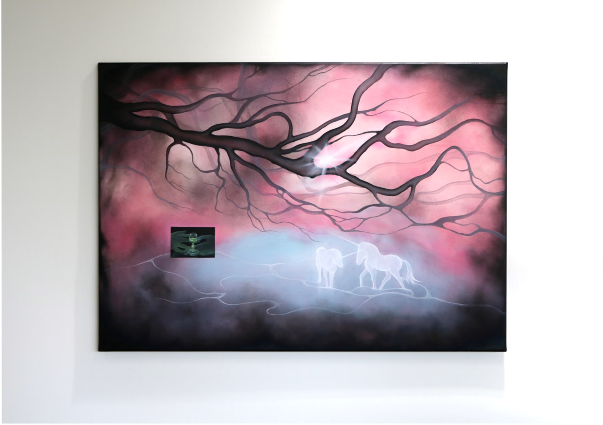 The image consists of a pink mist, beneath the surface of peace is a message of danger approaching, while at the centre the light hidden in the branch