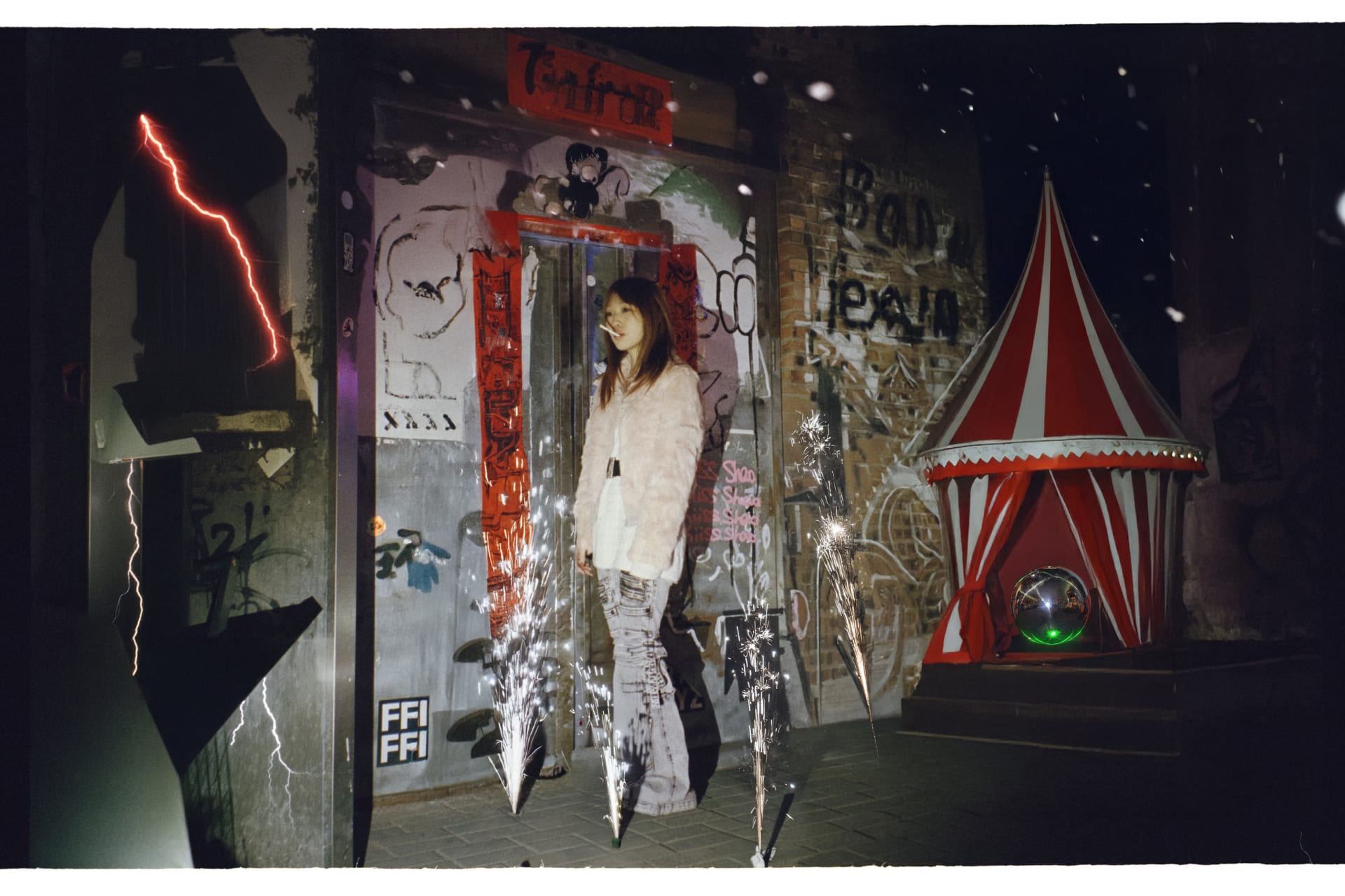 This is at the entrance of a club that holds many of my memories, and the image of the circus emerges once again