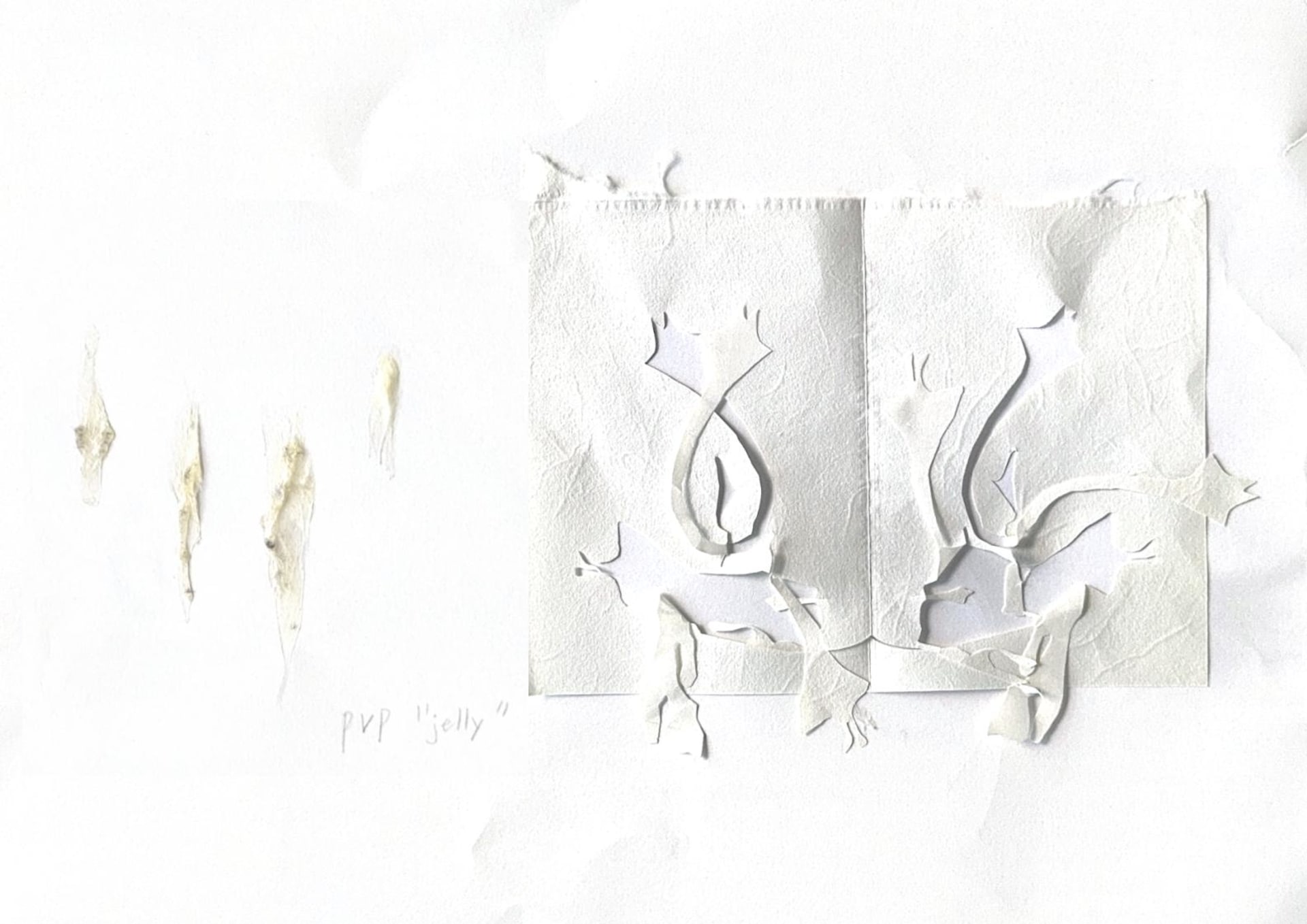 Sketchbook page with material sampling and paper experiments.