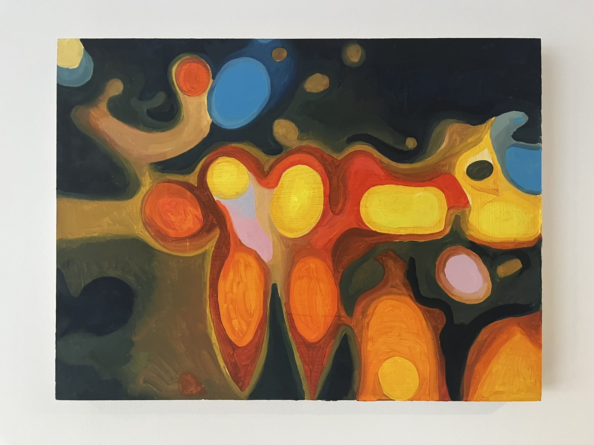 A painted abstract light scene in vivid colours like red, orange, yellow, blue and pink.