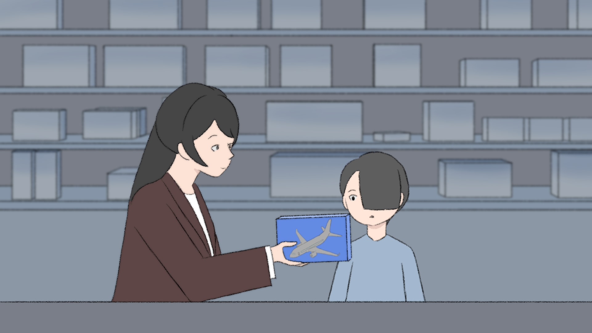 Still from the film where the mum is showing a toy airplane box to her son (main protagonist)