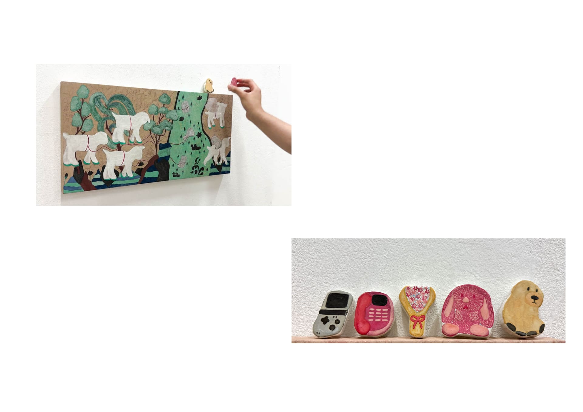 A wall-mounted pigment painting featuring stylized white sheep in a green and brown landscape. A hand is shown placing a magnetic object onto the pain