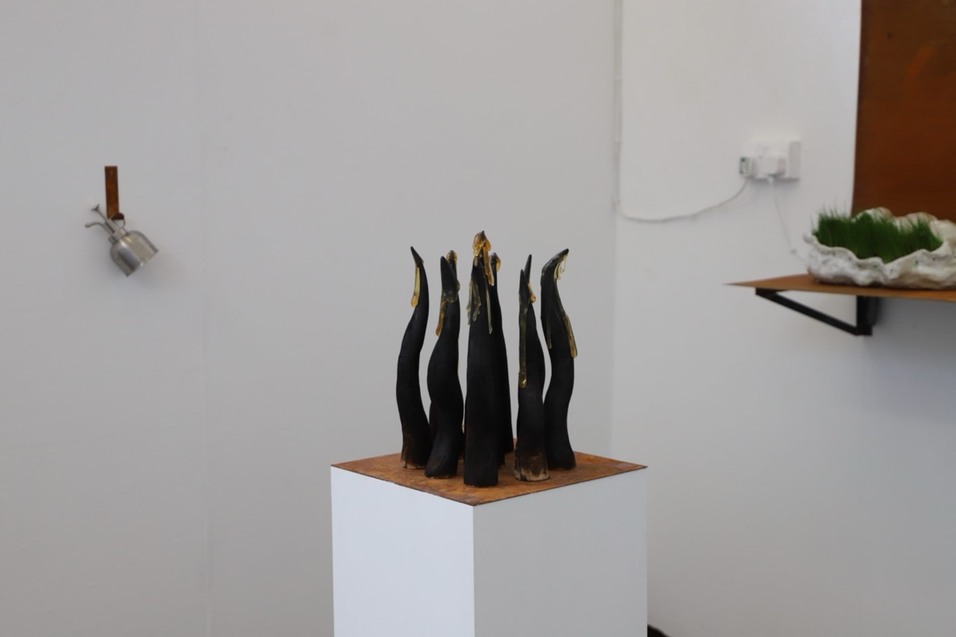 burned black suface wooden sculpture with melted sugar