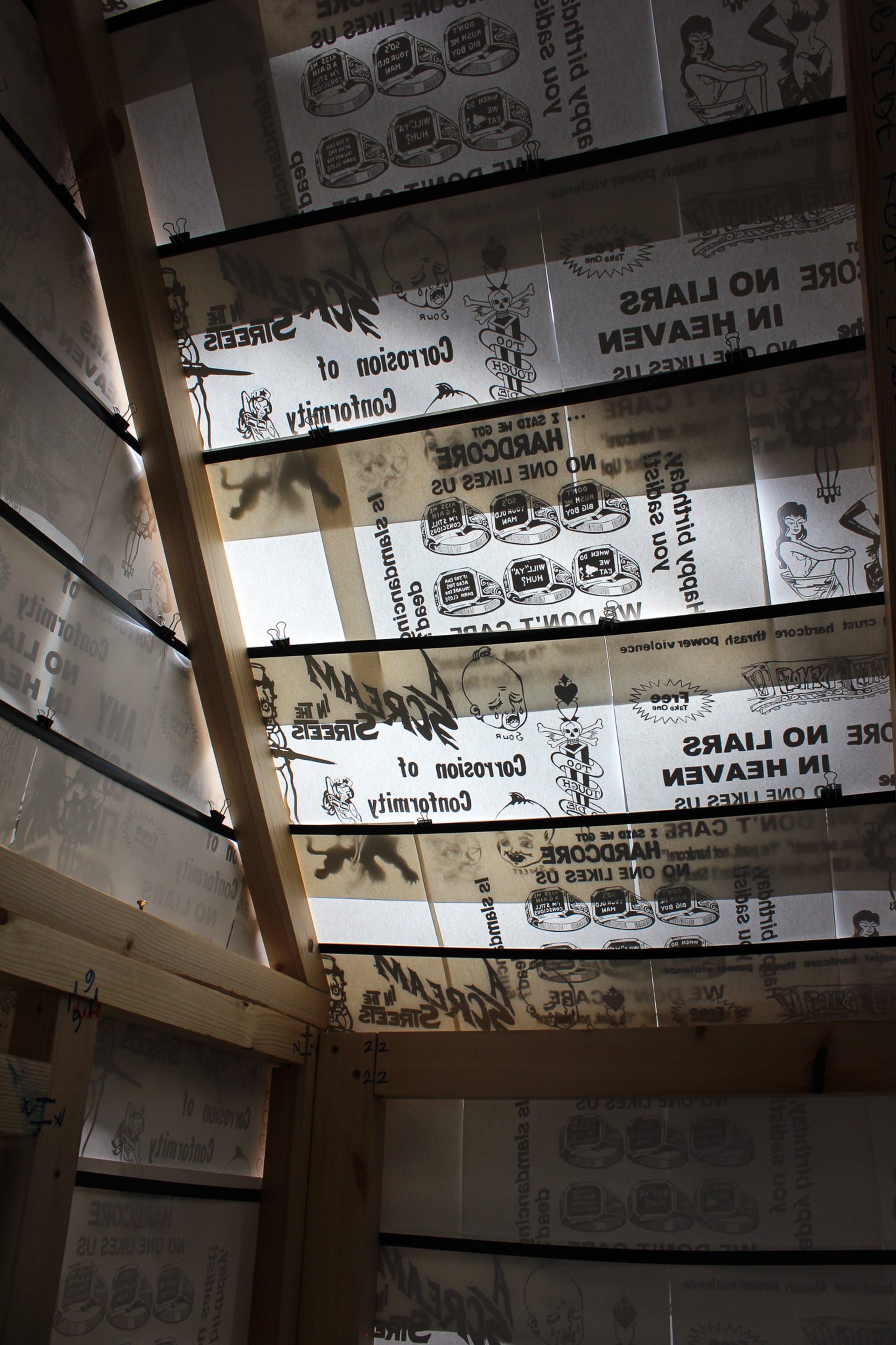 Interior view of the prints that make up the roof structure, like a X-Ray.