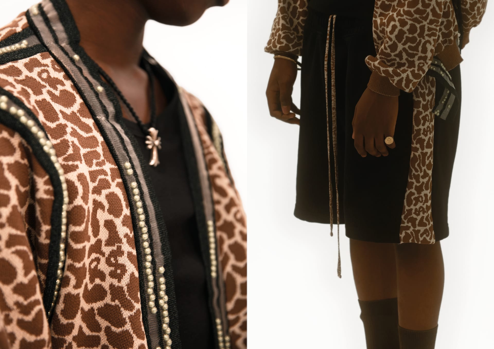 Close up detailed of the cardigan styled with matching black shorts that have the matching graphic print to the cardigan down the side of the shorts.