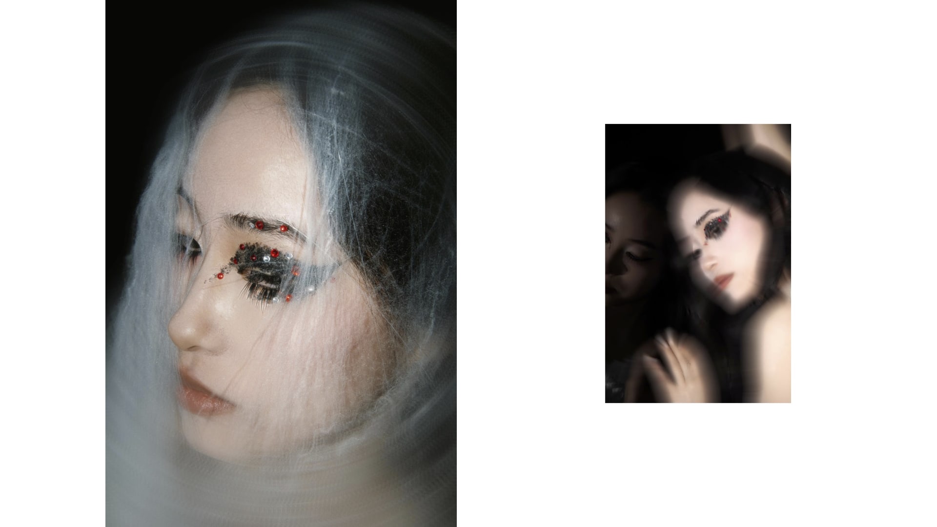 Model entangled in white web-like fabric, arms stretched upward, black background.