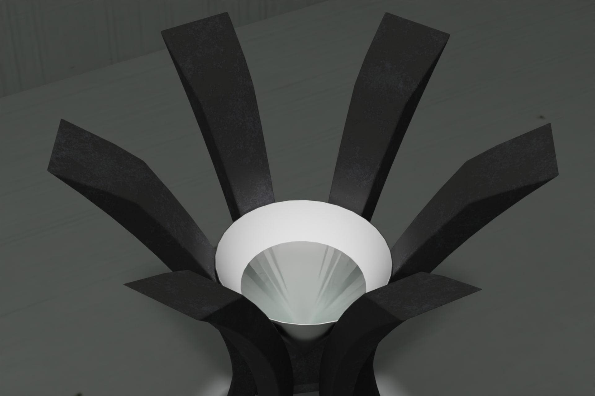 It's another view of the futuristic, altar-like installation with a cone- shaped water container.