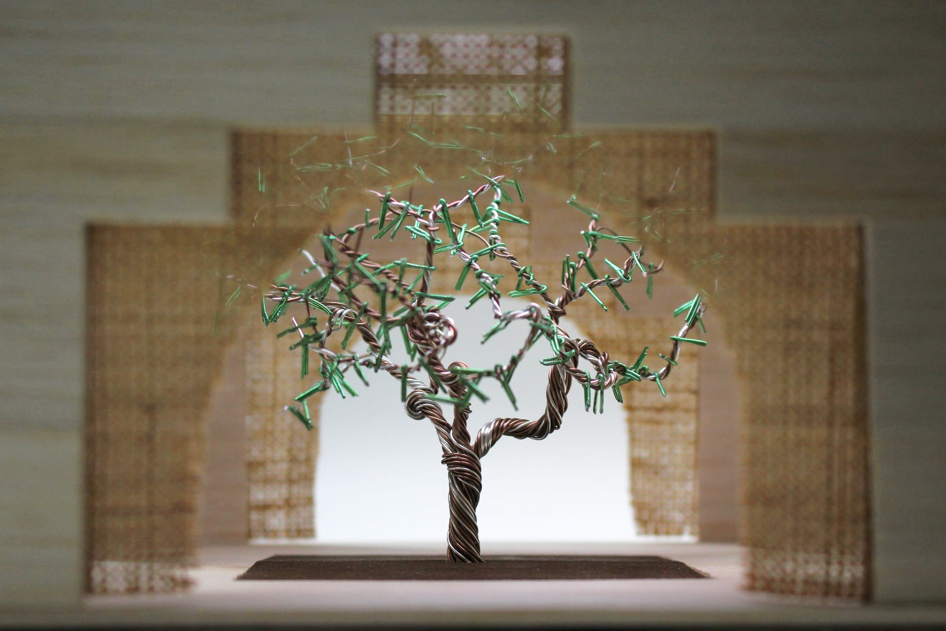 A model of the entrance to the 'Garden of Harvest,' with the olive tree at the centre.
