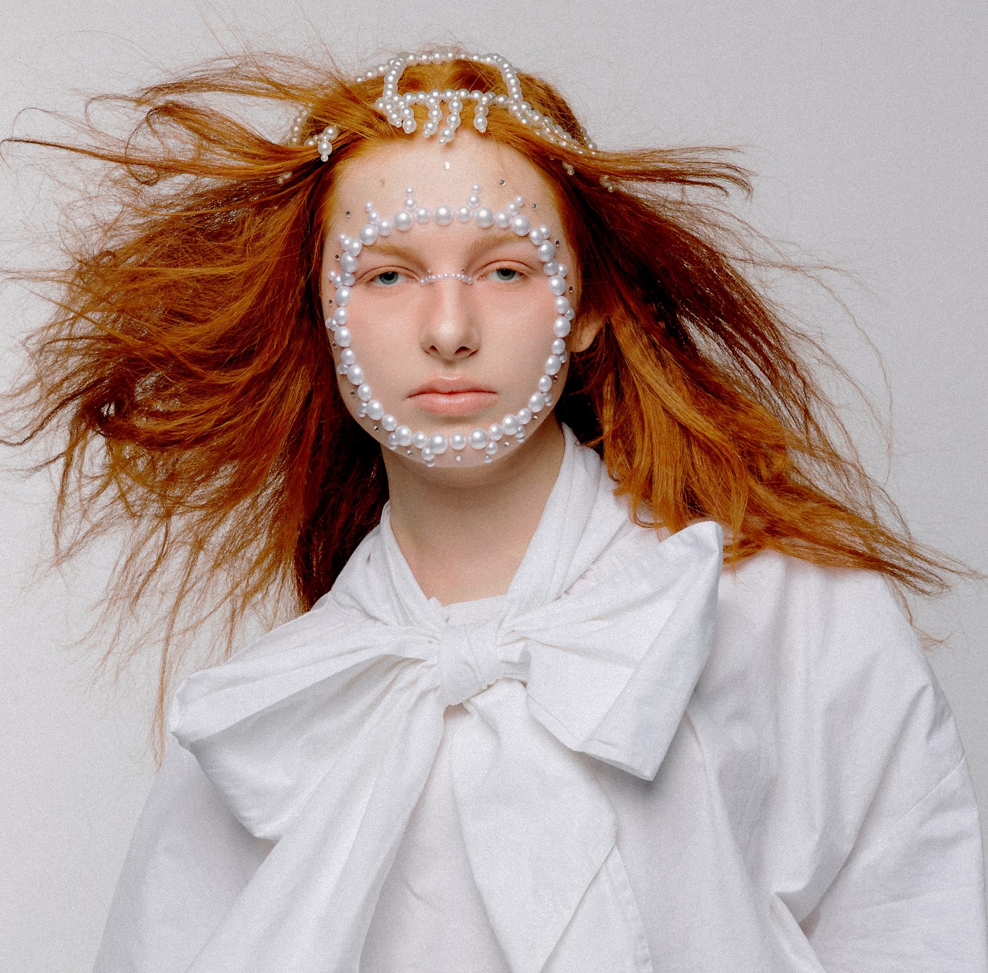 Perfect round face with pearl