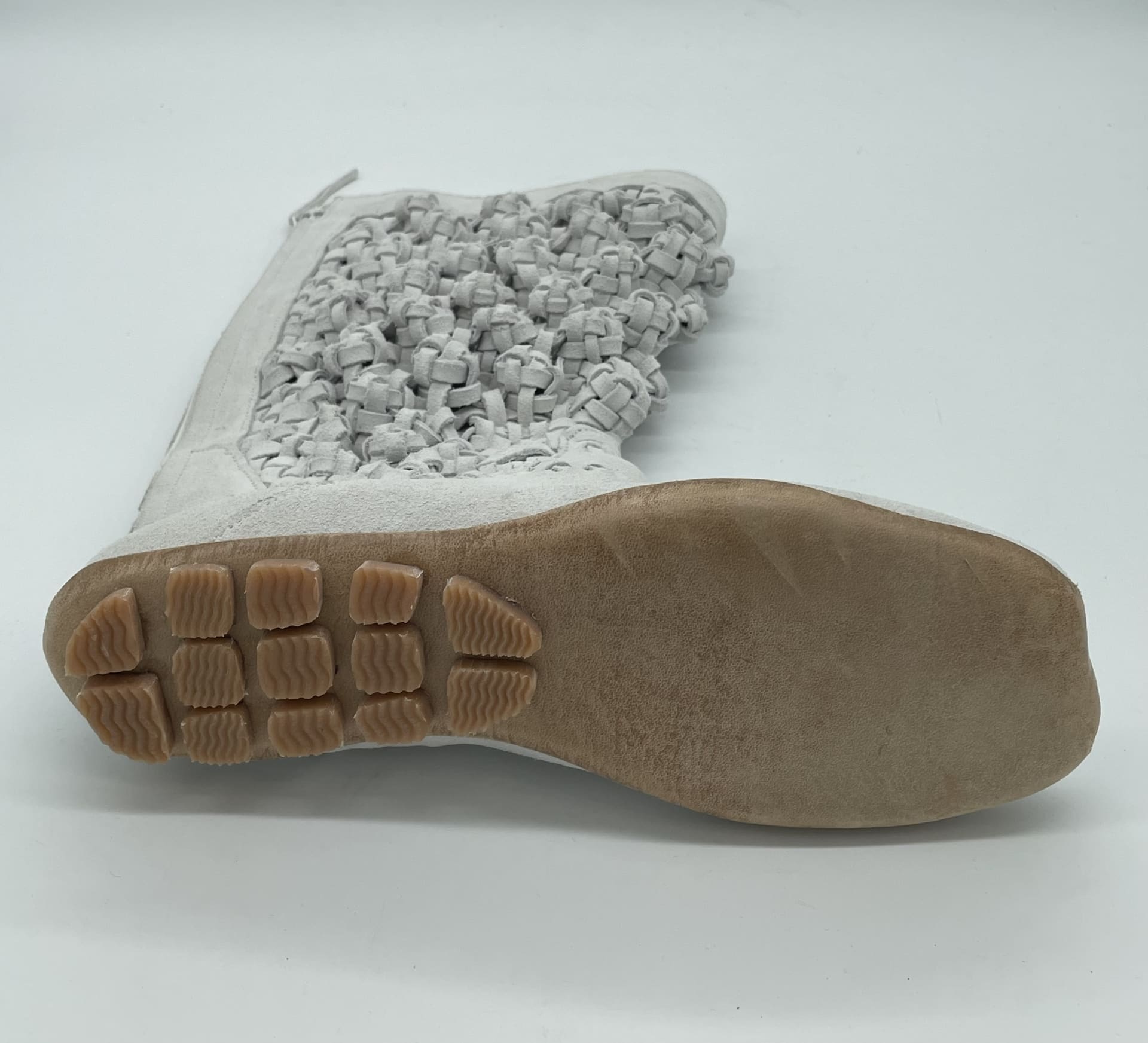 trainer style sole grips on leather sole unit