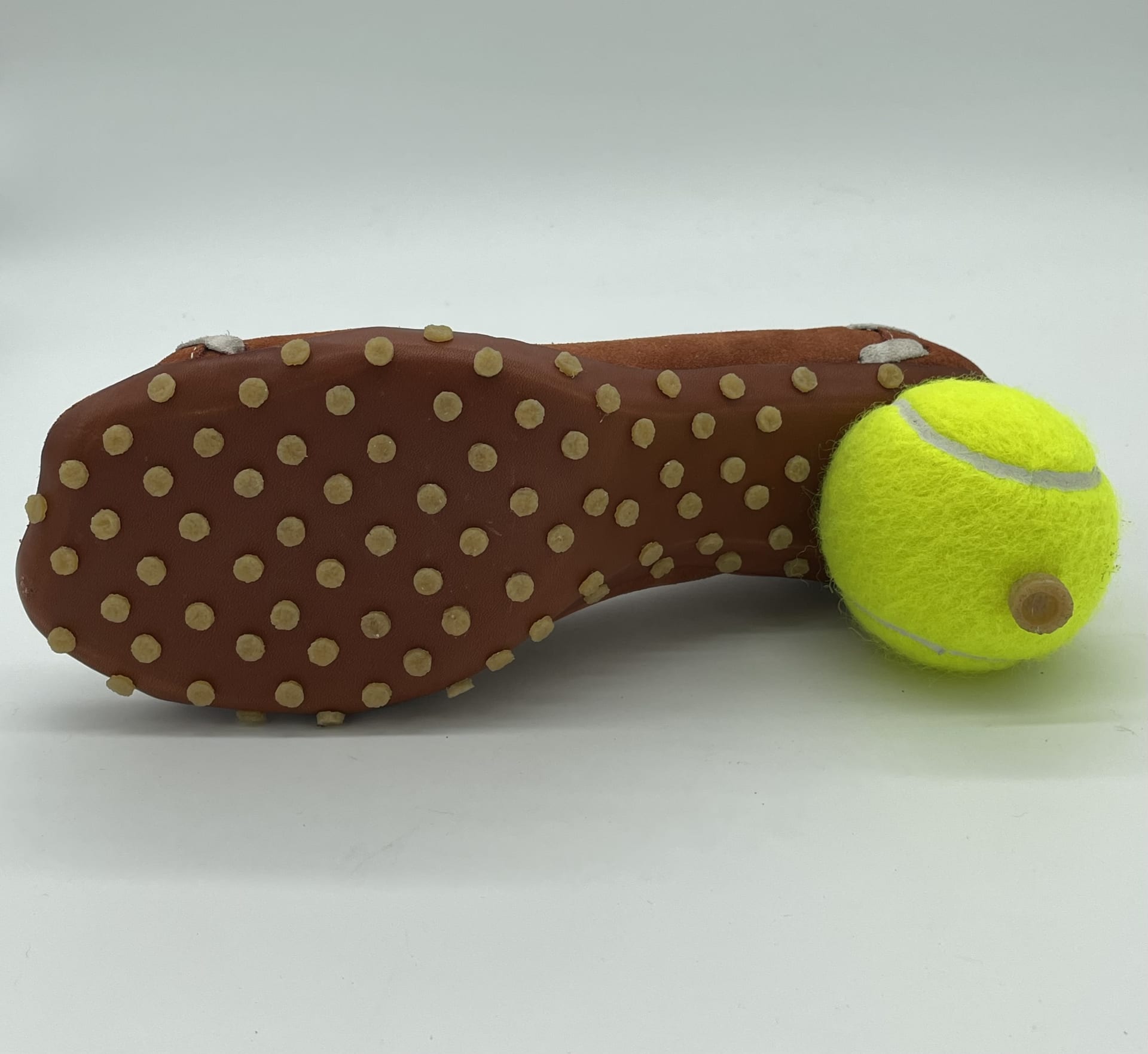teennis style grips on sole with tennis ball heel