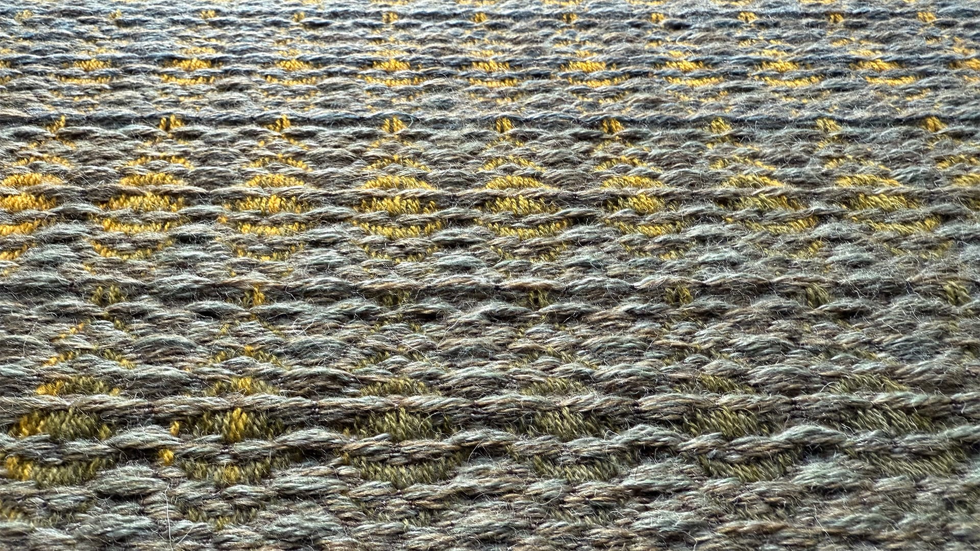 The image shows one piece of collection in blue and yellow, with the pattern that show how the position  becomes direction and its relativity. 