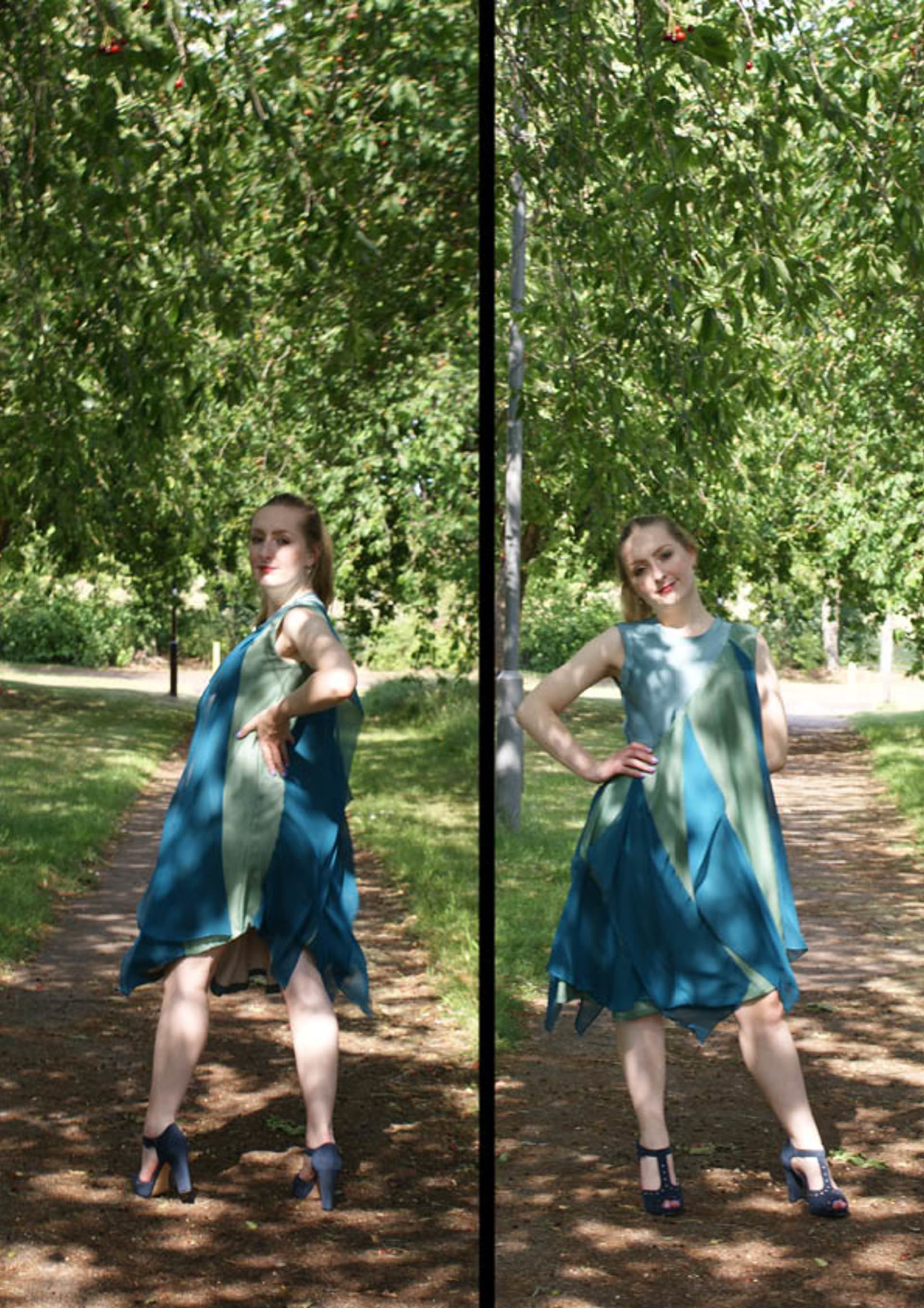 Blue and green dress with blue draped panels down the front.