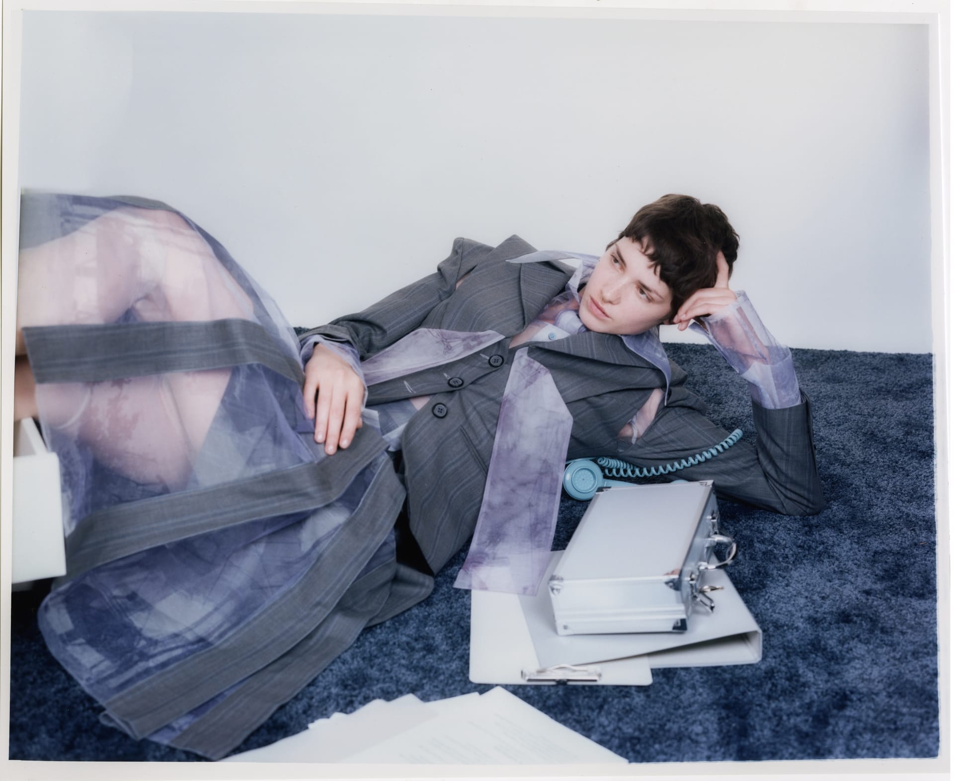 The collection explores the tension between gender, authority, and personal identity through the lens of power dressing. 