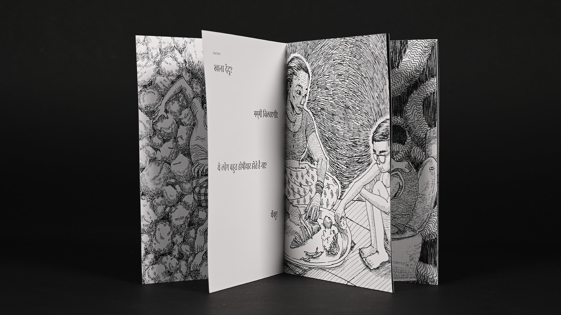 Black and white zine showcasing poetry and illustrations