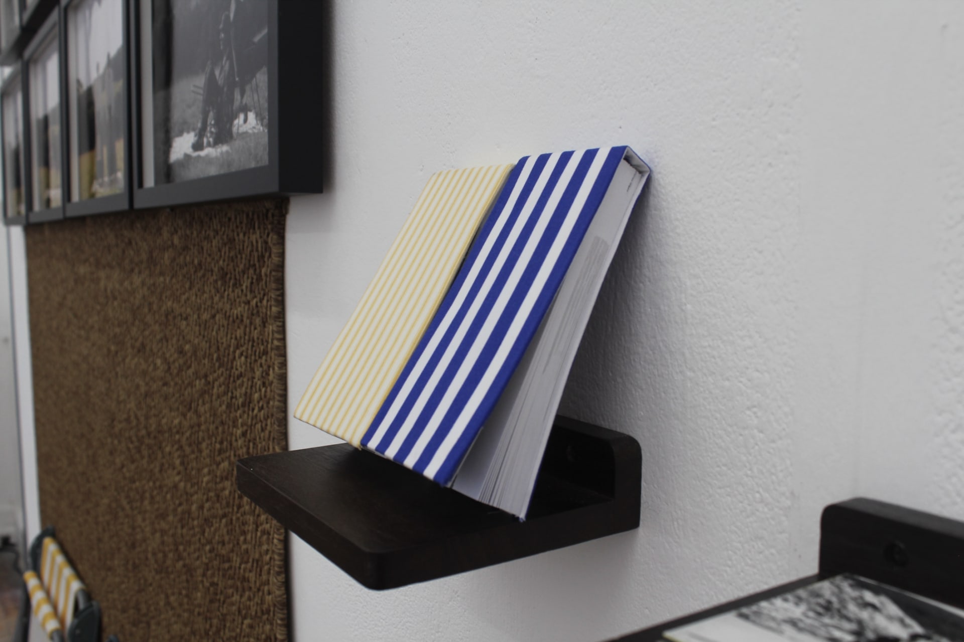 1 yellow and white fabric flip book and 1 blue and white fabric flip book