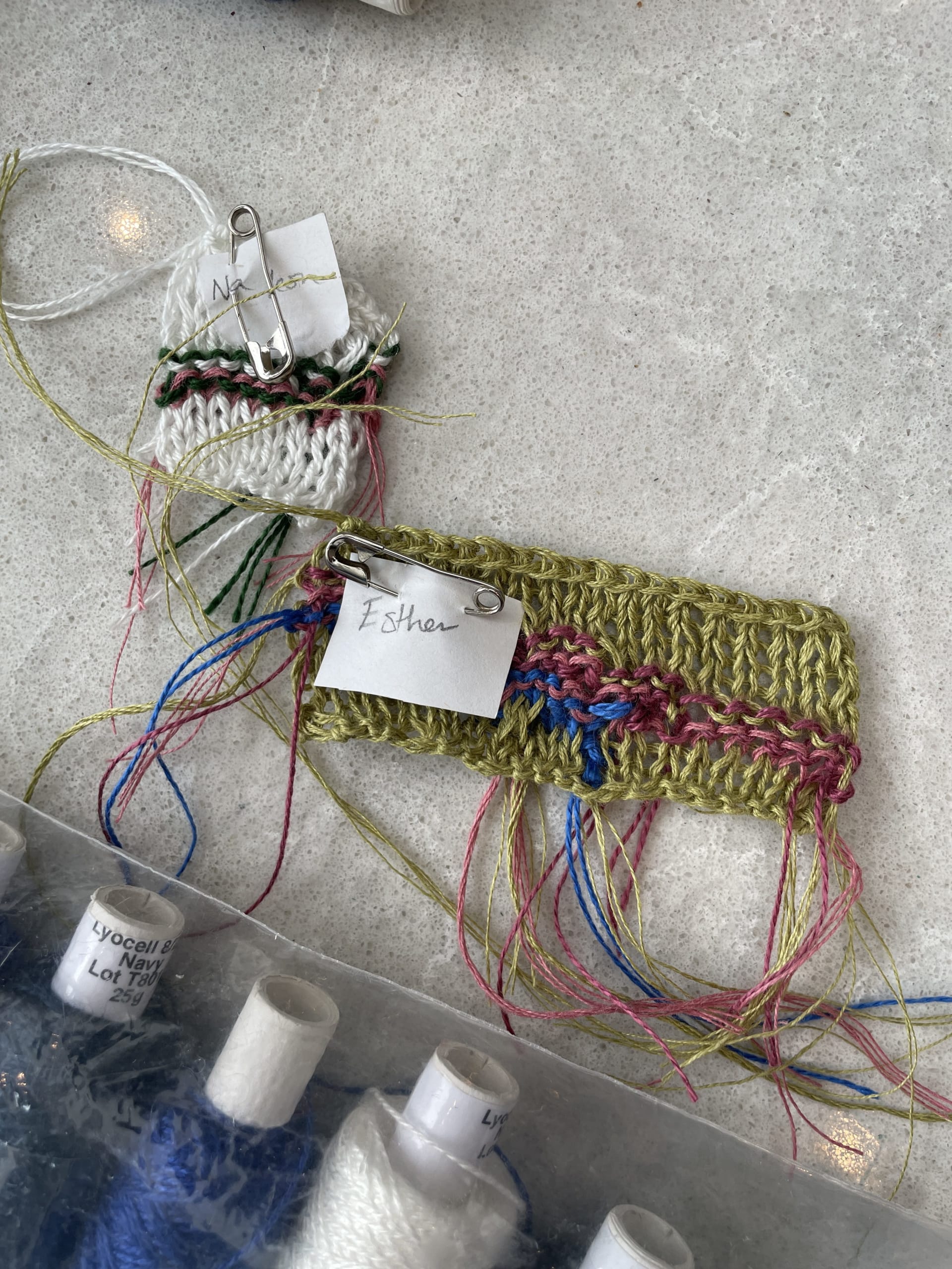 Knitted Strips, labelled 'Na Yeon' and 'Esther'.