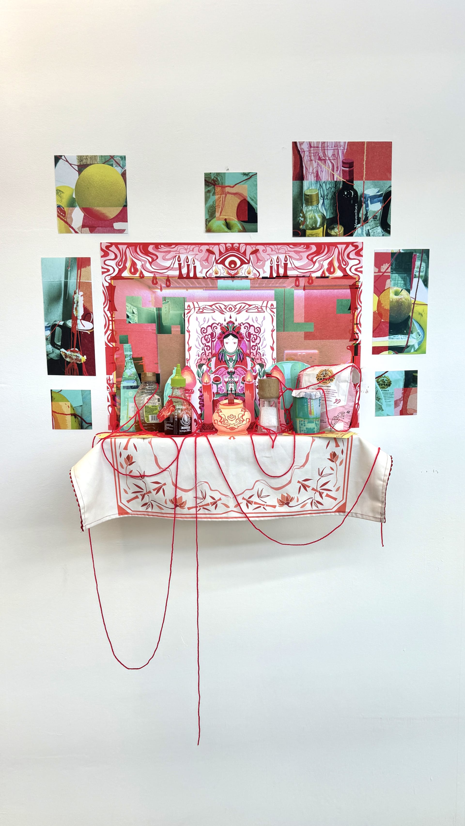 This installation explores the ancient Chinese culture of the Kitchen God, a domestic deity believed to protect the household and determine the family