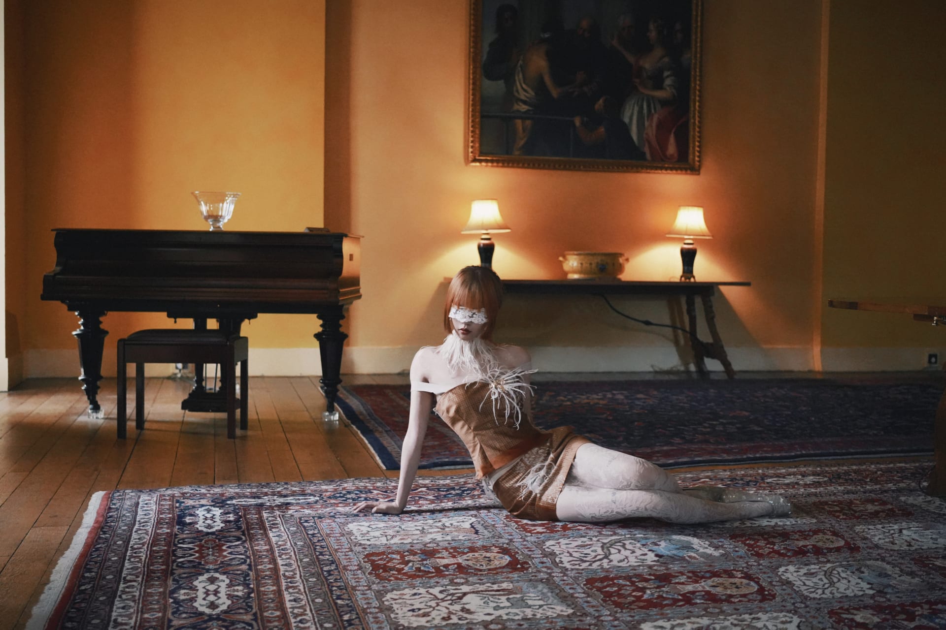 This photo was taken in Eltham Palace. The model was wearing a suit made of sequin print-based fabric, partly with flock butterfly prints, and hand-em