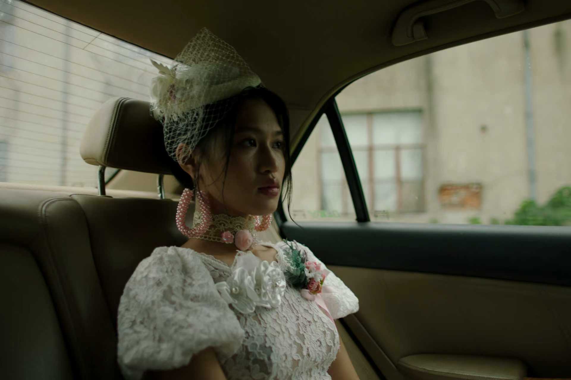 Still Frame - Girl at the car ready to her marriage