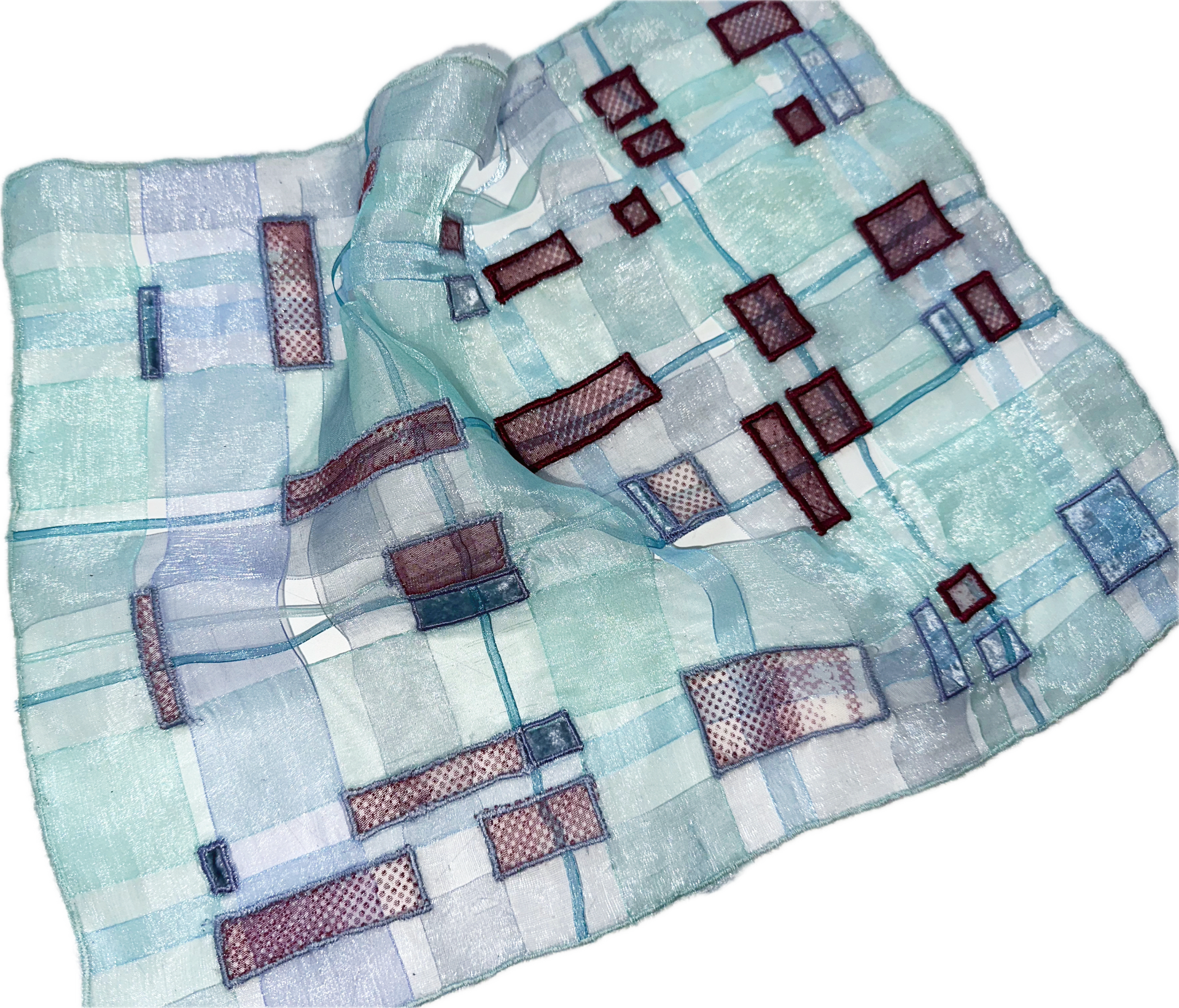 The semi-transparent fabric woven from ribbons is combined with screen-printed mesh fabric and velvet using applique embroidery techniques.