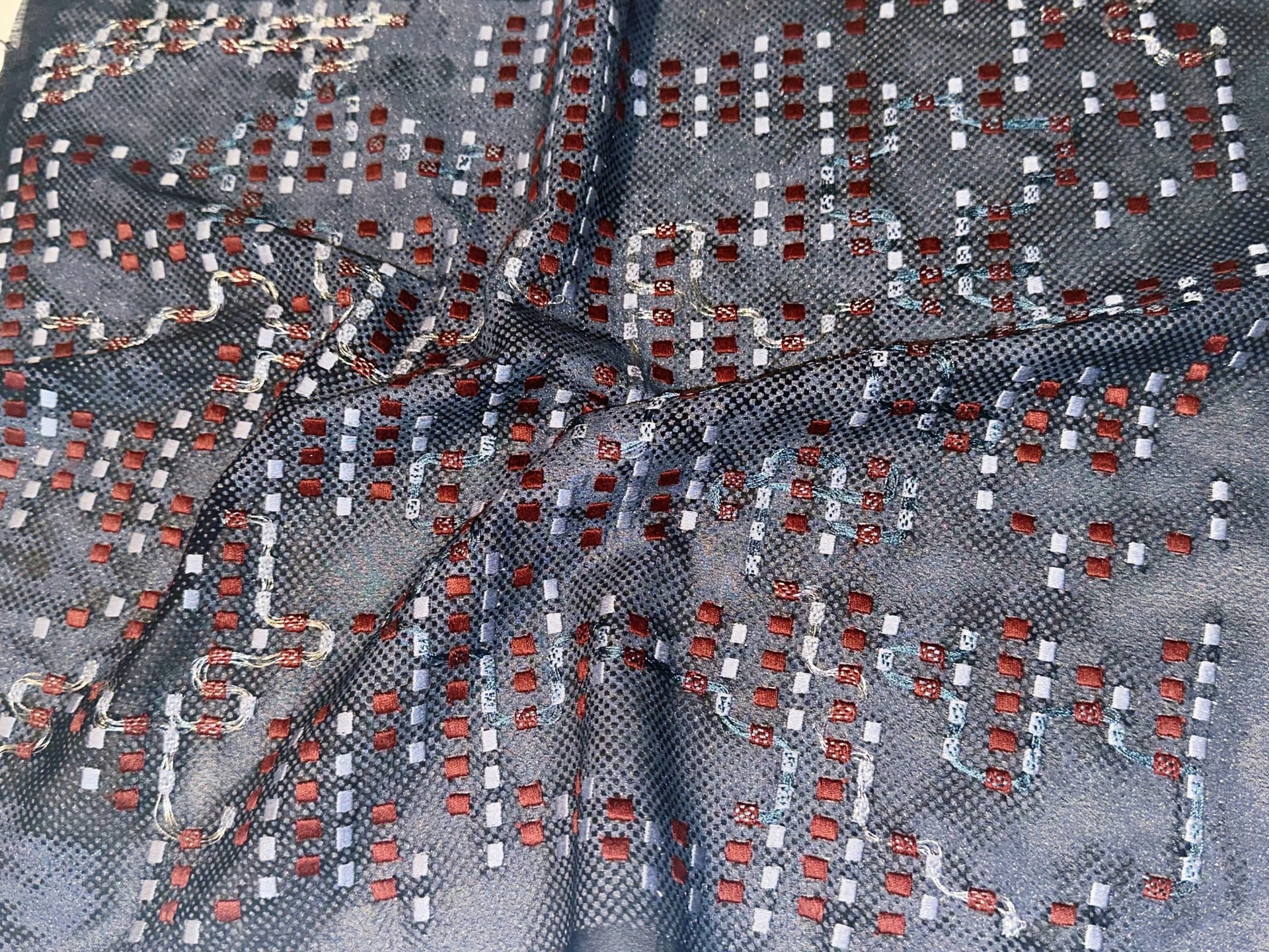 Deep blue natural silk, silver metallic wire screen printing, computer embroidery combined with hand weaving.