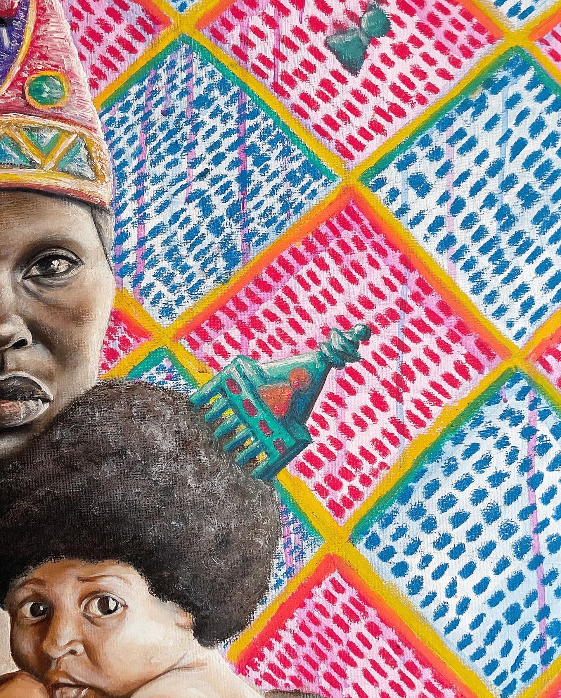 Close up of the baby and background of the painting made up of blue and pink textured diamond shapes