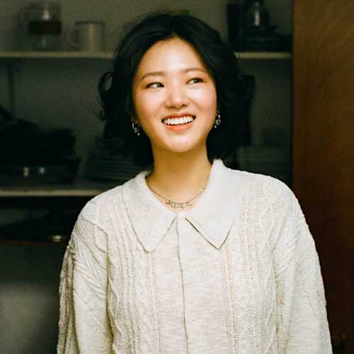 A portrait photo of Rebecca smiling.