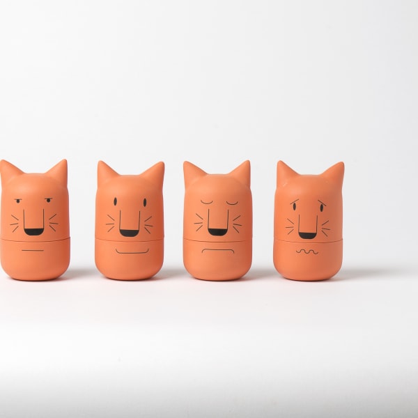 Four terracotta cat heads 