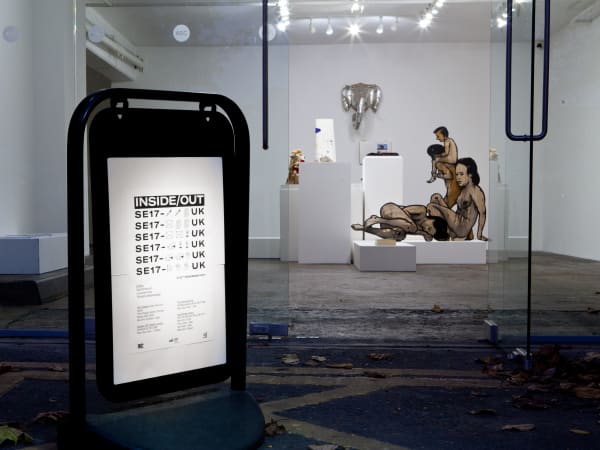 A sign outside a gallery 