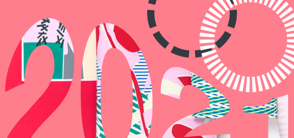 pale pink background with numbers 2021 in decorative red, green and white font