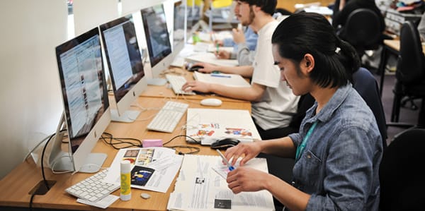 Student working at their computer.