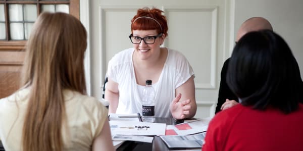 Group of students at a round table