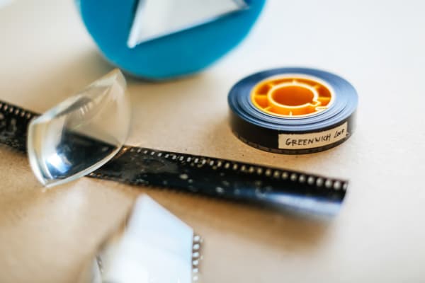 Film reel with magnifying glass