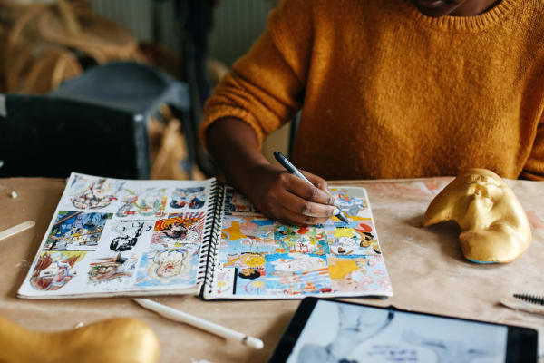 A student sketching in the studio