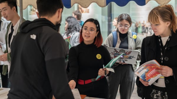 Students talking to employers