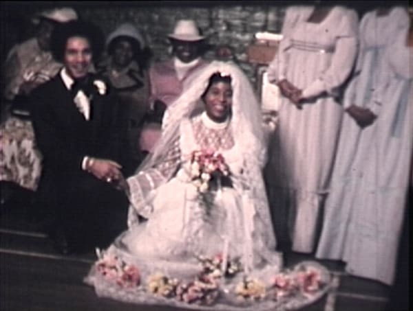 Still from a video recording of a wedding