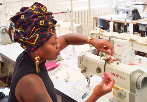 Student using sewing machine