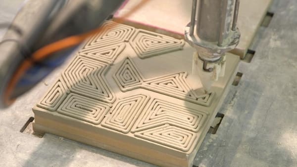 Tile being 3D printed.