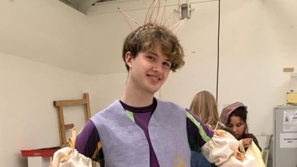 male student wearing costume